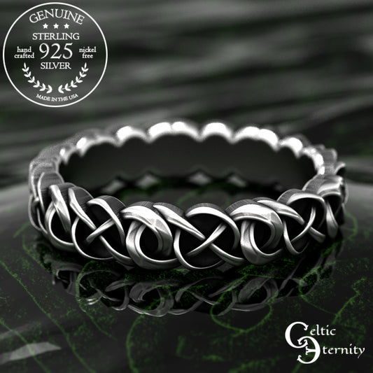 A sterling silver Celtic knot ring with a textured, wavy outer edge, displayed on a dark reflective surface. A circular badge in the top-left corner reads 'GENUINE STERLING 925 SILVER', and the brand logo 'Celtic Eternity' is visible in the bottom-right corner.